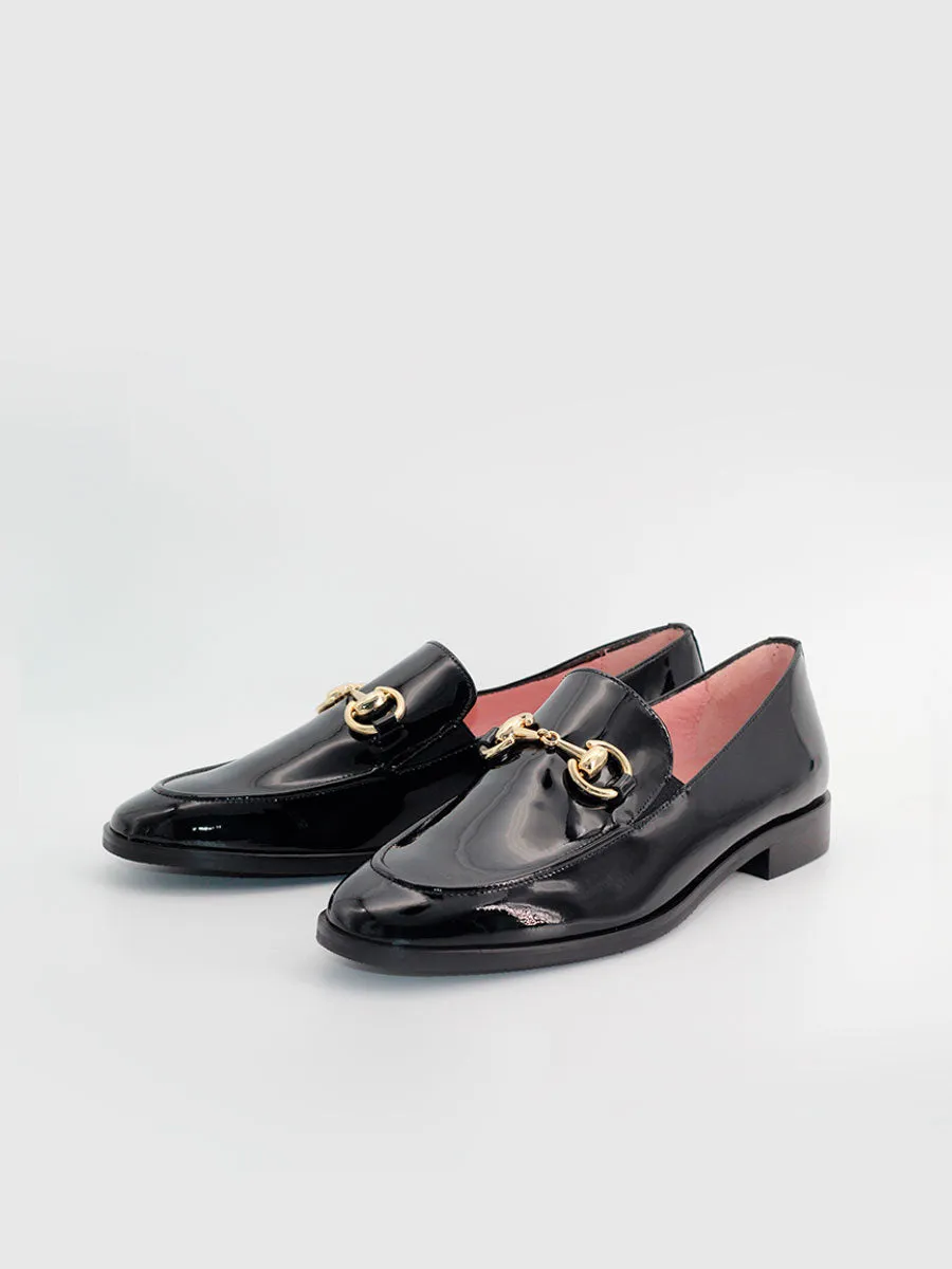 Black patent leather embellished Messina loafers.