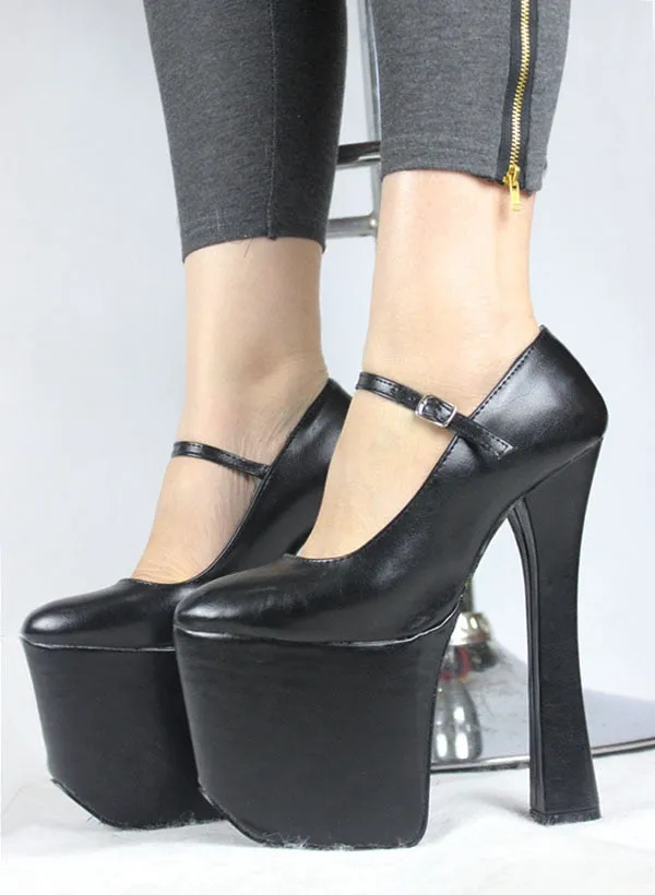 Black patent platform Mary Janes pumps with chunky heels.