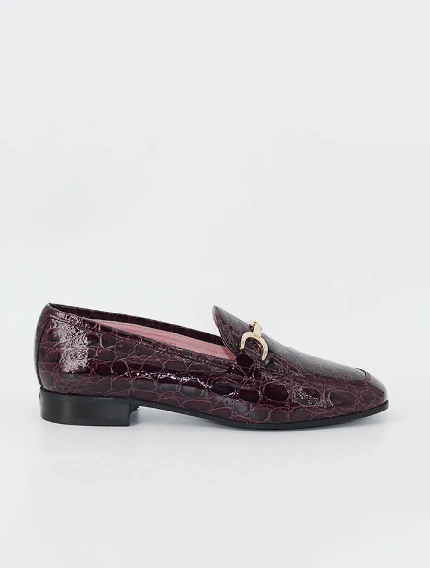 Burgundy patent leather Giverny moccasins.