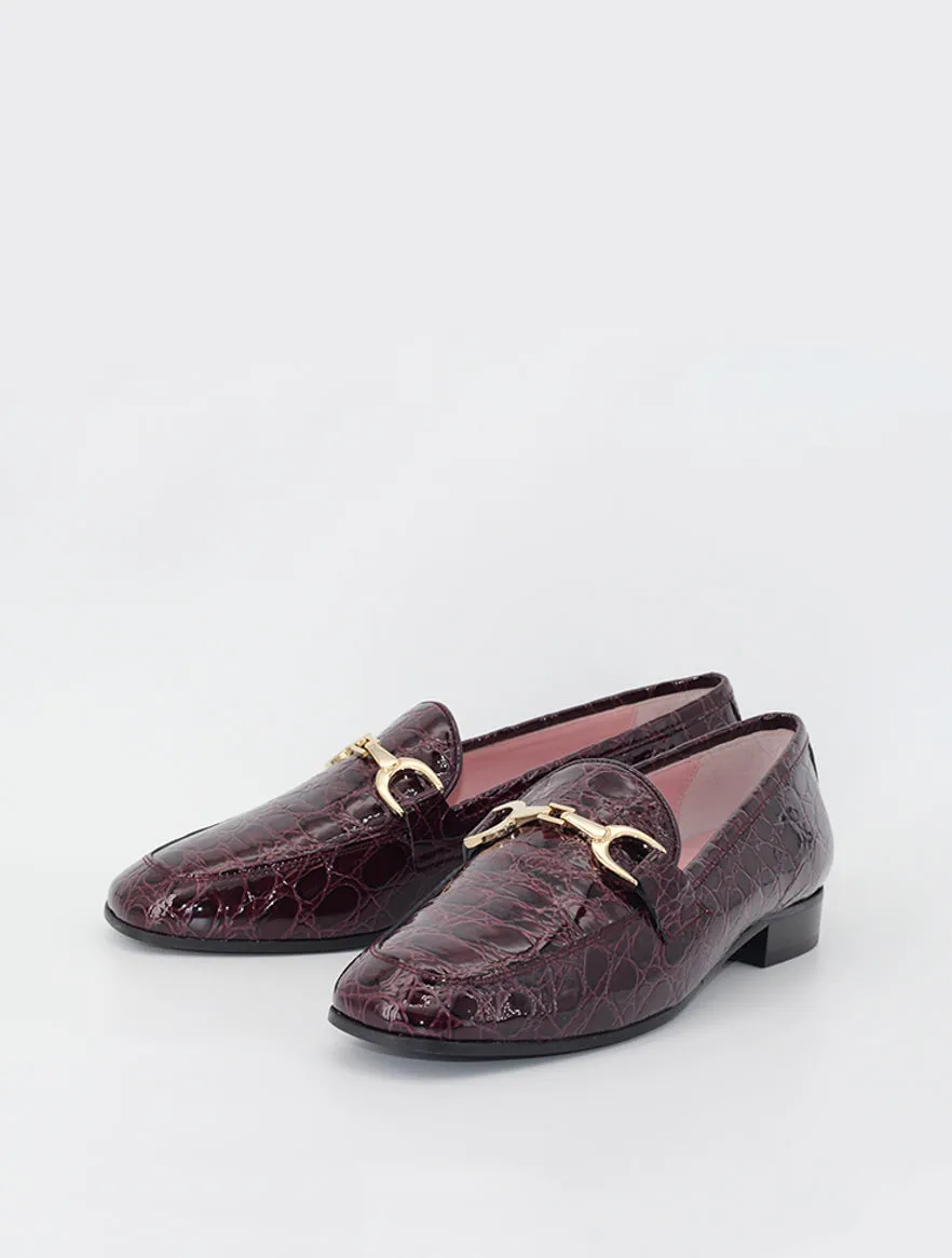 Burgundy patent leather Giverny moccasins.