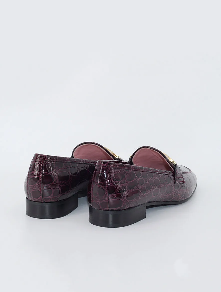 Burgundy patent leather Giverny moccasins.