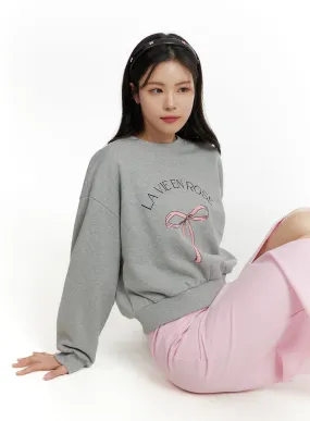 Sweatshirt with Ribbon Graphic code OF414