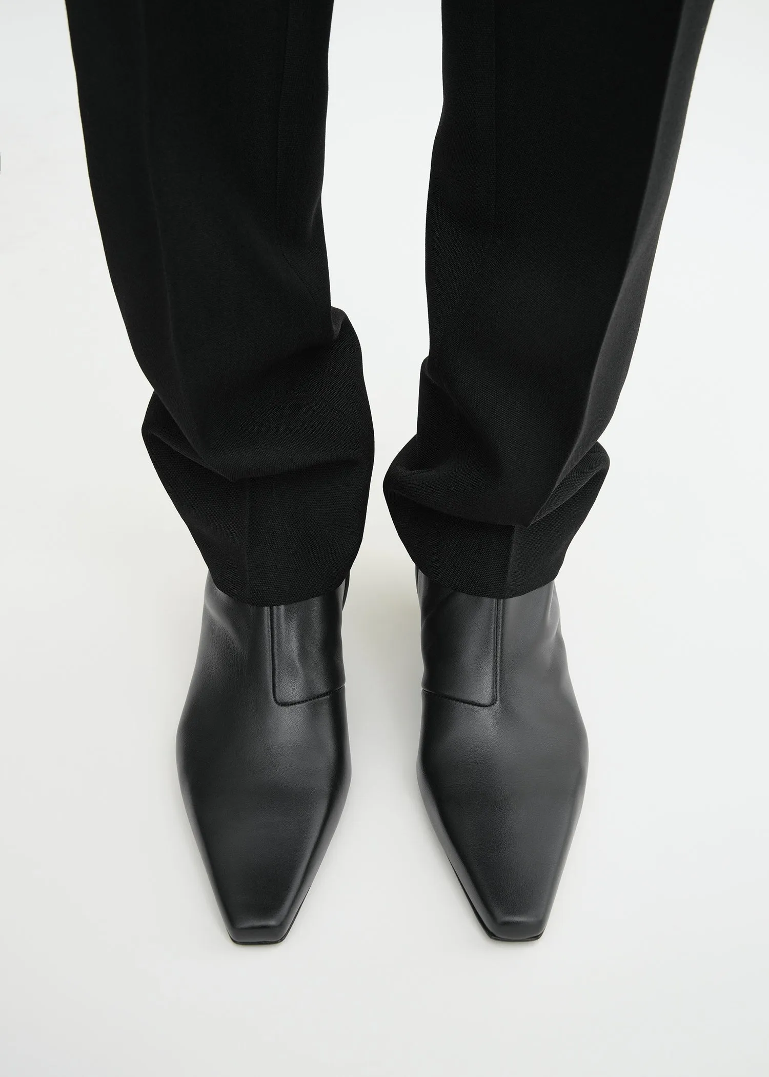 Slim leather ankle boots black