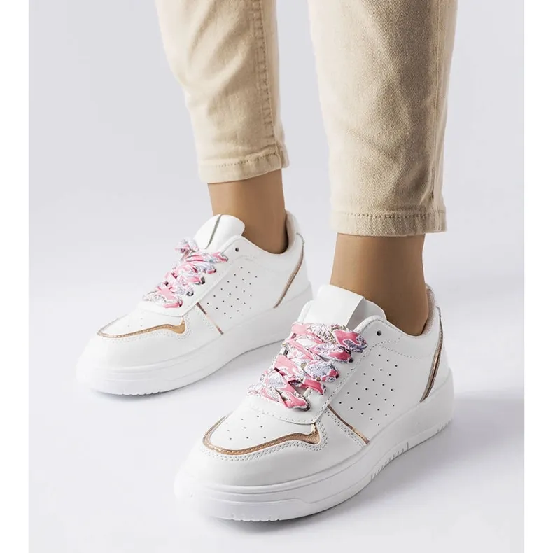 White sneakers tied with Pryor ribbon